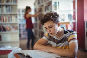 Teen who may have OCD and autism is really focused on homework.