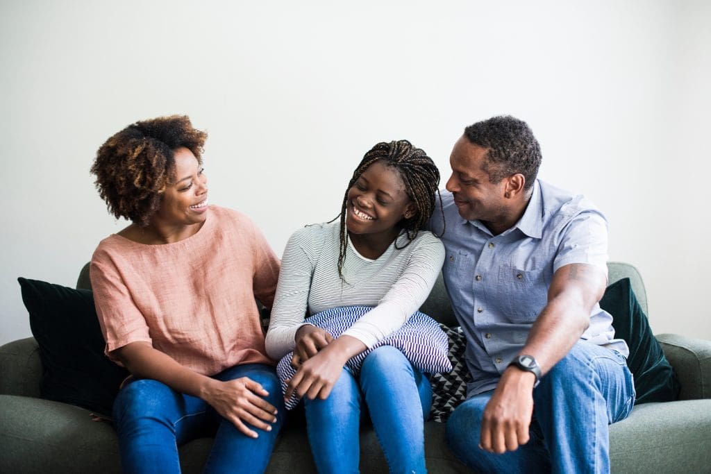 Teen and family resolve conflict through empathy and communication.