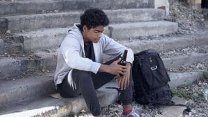Teen wonders if alcohol is a drug when drinking alone.
